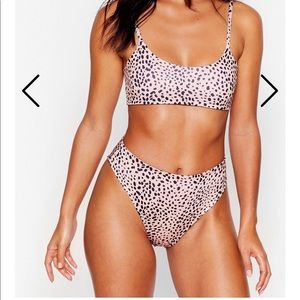 Pink and black two piece swimsuit